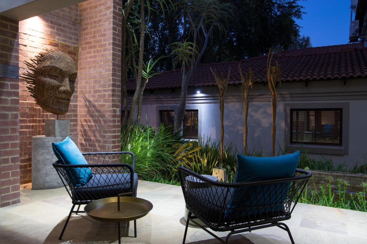Menlyn Boutique Hotel Pretoria-Noord Extérieur photo The hotel's courtyard