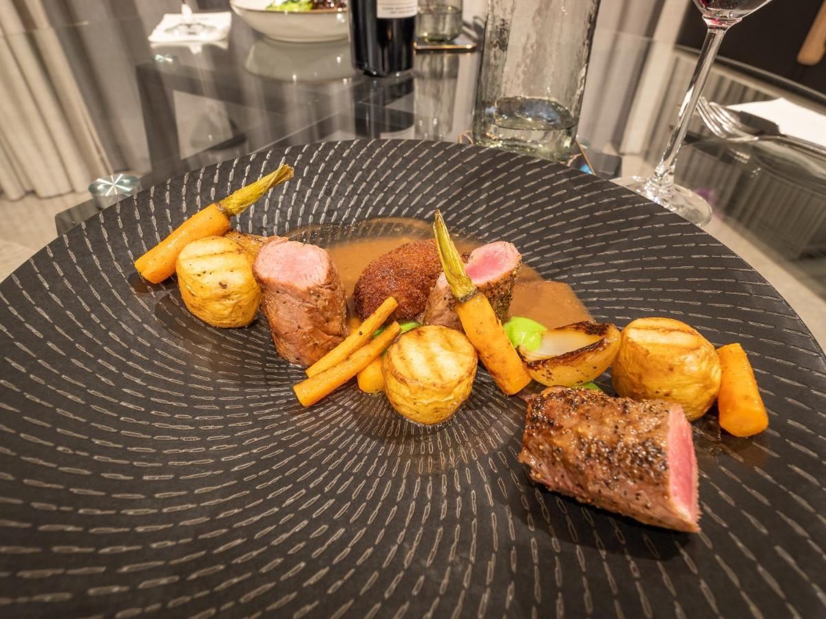 Menlyn Boutique Hotel Pretoria-Noord Extérieur photo A plate of food