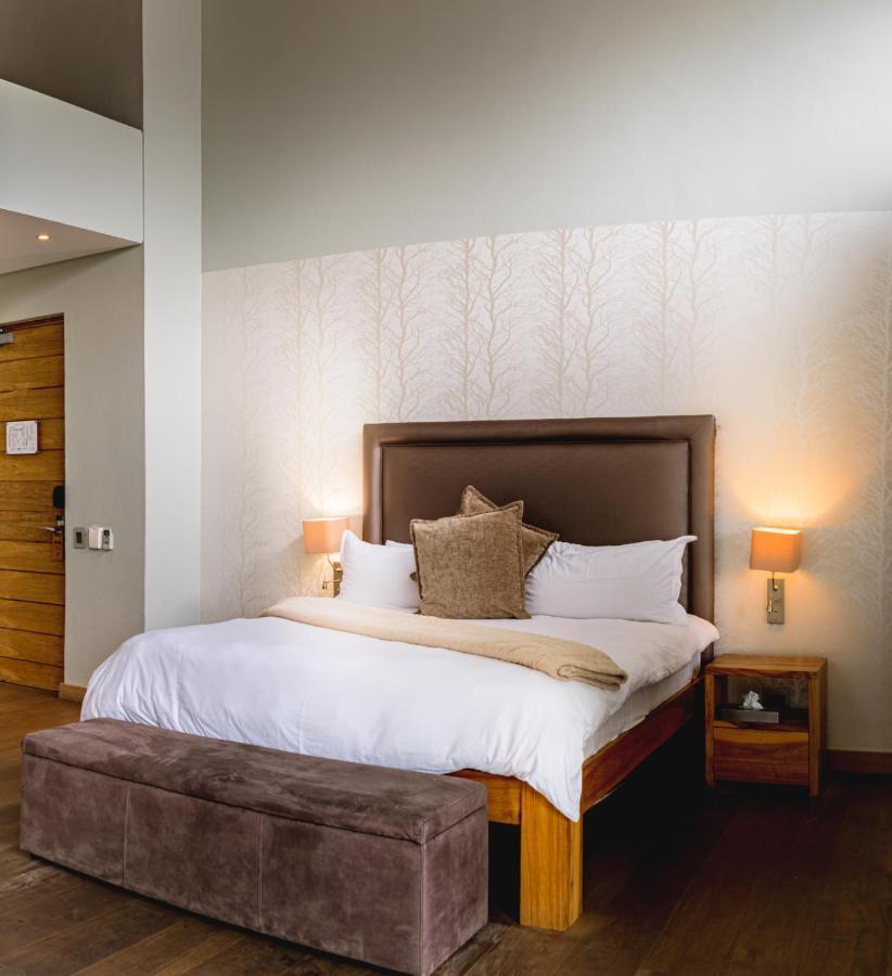 Menlyn Boutique Hotel Pretoria-Noord Extérieur photo A bedroom at the Protea Hotel, Centurion