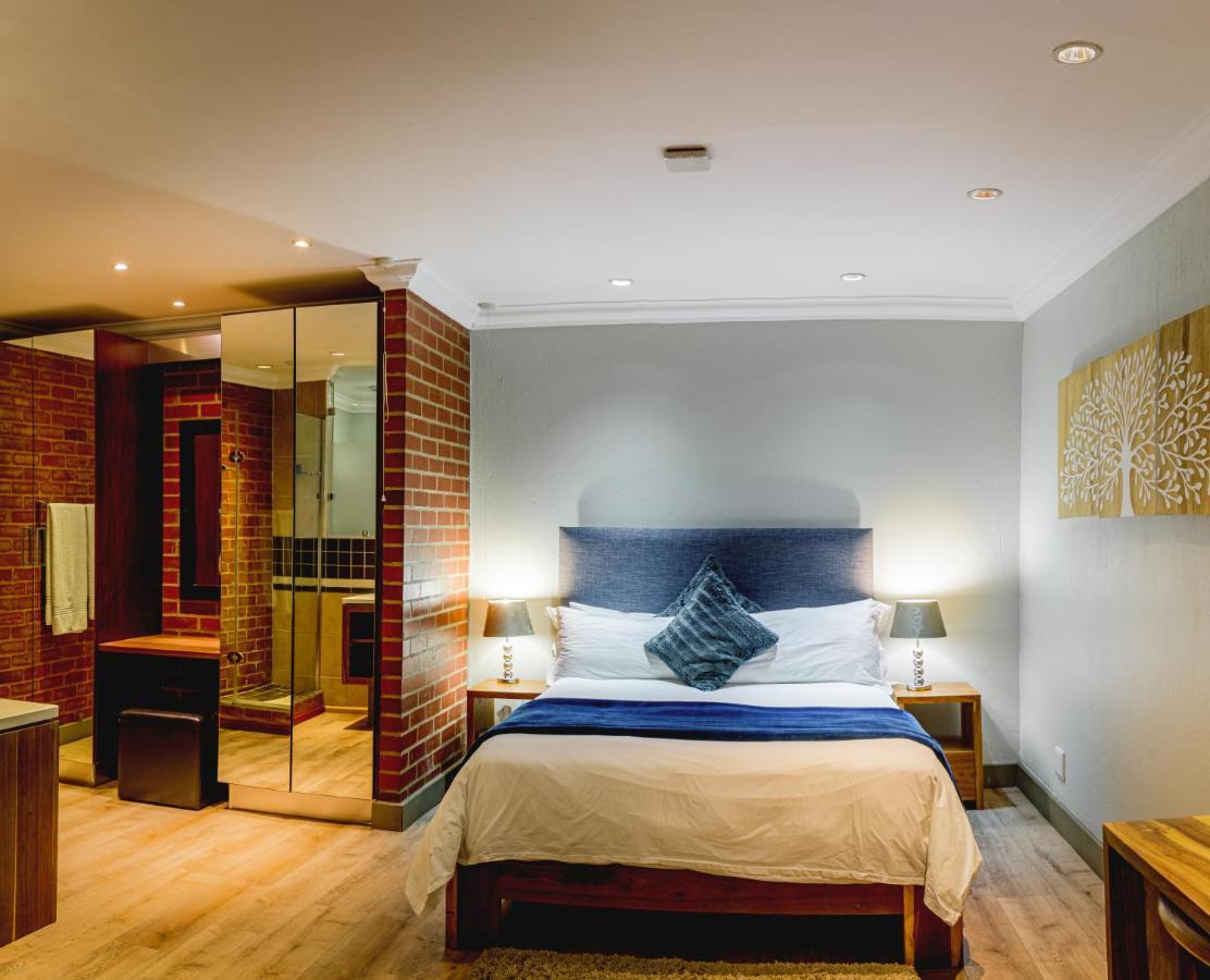Menlyn Boutique Hotel Pretoria-Noord Extérieur photo A room at the hotel