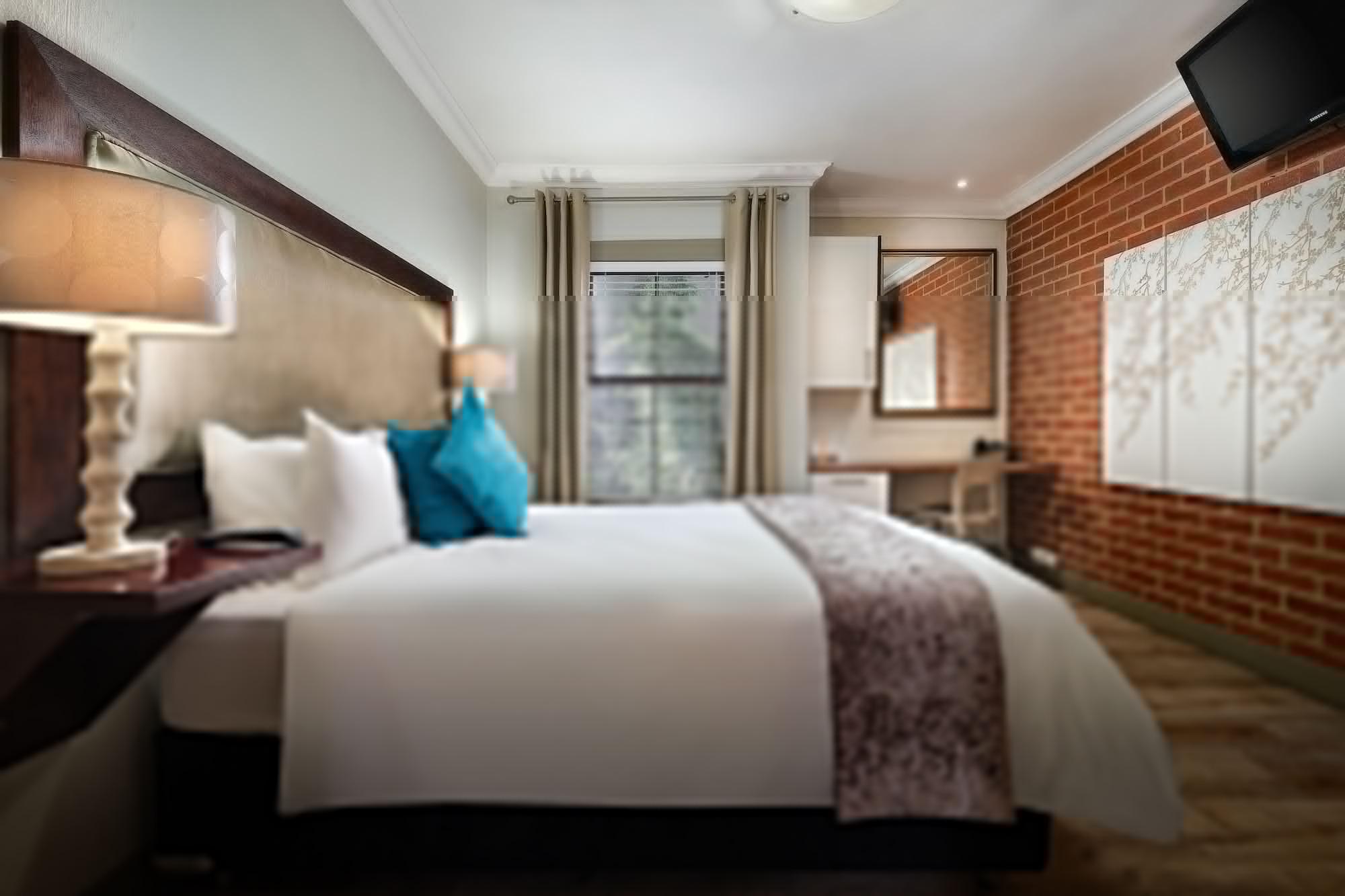 Menlyn Boutique Hotel Pretoria-Noord Extérieur photo A bedroom at the hotel