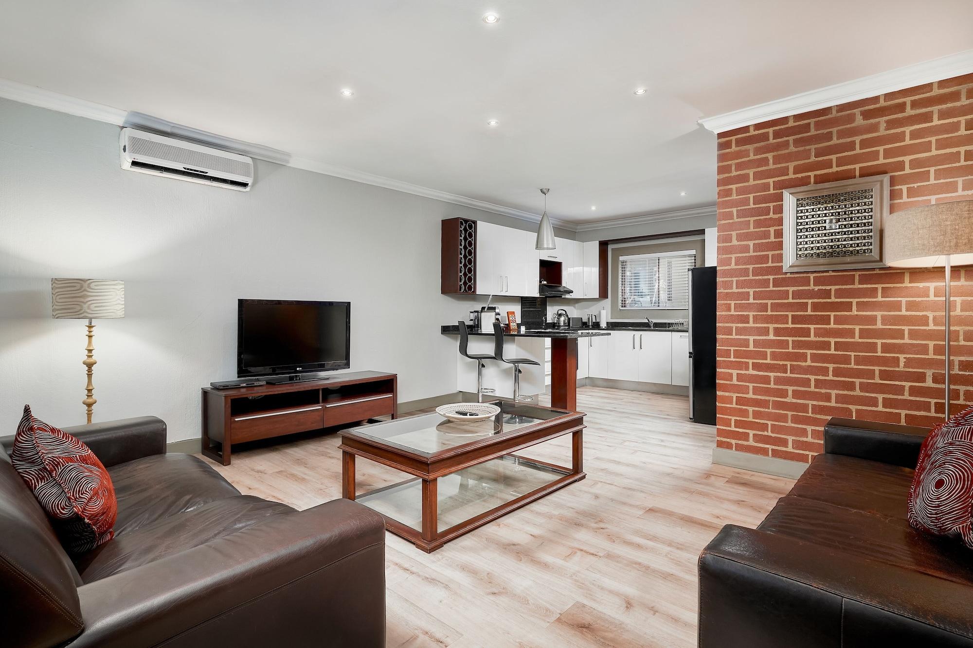 Menlyn Boutique Hotel Pretoria-Noord Extérieur photo A typical apartment at the residence