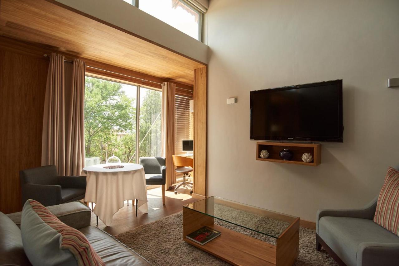 Menlyn Boutique Hotel Pretoria-Noord Extérieur photo A living room at the hotel